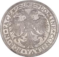 reverse of 1 Thaler (1556) coin with DAV# 8783 from Swiss cantons. Inscription: DOMINE*CONSERVA*NOS*IN*PACE*