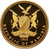 obverse of 100 Dollars - 5th Anniversary of Independence (1995) coin from Namibia. Inscription: UNITY LIBERTY JUSTICE REPUBLIC OF NAMIBIA 1995