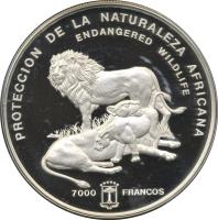 reverse of 7000 Francos - Endangered wildlife: Lions (1992) coin with KM# 76 from Equatorial Guinea. Inscription: PROTECCION DE LA NATURALEZA AFRICANA ENDANGERED WILDLIFE 7000 FRANCOS