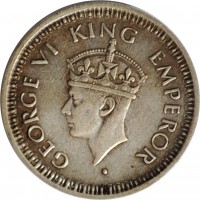 obverse of 1/4 Rupee - George VI (1943 - 1945) coin with KM# 547 from India. Inscription: GEORGE VI KING EMPEROR