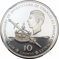 reverse of 10 Crowns - Elizabeth II - Prince Charles-10th Anniversary of Investiture (1979) coin from Turks and Caicos Islands. Inscription: 10th ANNIVERSARY OF INVESTITURE OF CHARLES AS PRINCE OF WALES 10 CROWNS