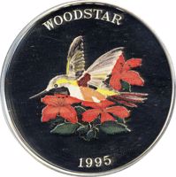 reverse of 25 Crowns - Elizabeth II - Woodstar Bird (1995) coin with KM# 211 from Turks and Caicos Islands. Inscription: WOODSTAR 1995