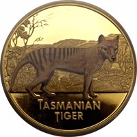 reverse of 100 Dollars - Elizabeth II - Tasmanian Tiger (2011) coin with KM# 511 from Niue. Inscription: TASMANIAN TIGER