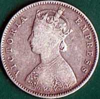 obverse of 1/2 Rupee - Victoria (1877 - 1899) coin with KM# 491 from India. Inscription: VICTORIA EMPRESS