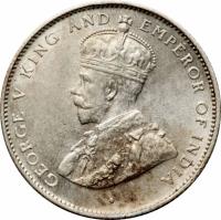 obverse of 50 Cents - George V (1919 - 1929) coin with KM# 109a from Ceylon. Inscription: · GEORGE V KING AND EMPEROR OF INDIA